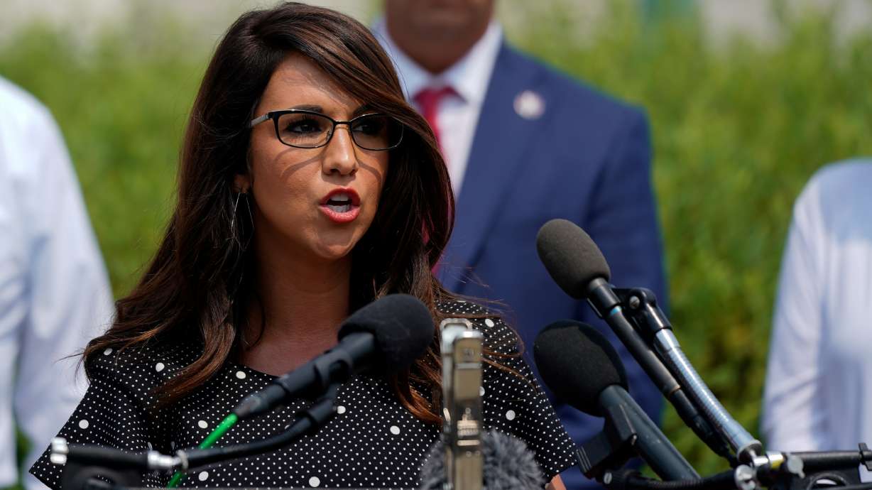 U.S. Rep. Lauren Boebert, R-Colorado, flanked by other members of the House Freedom Caucus, speaks during a news conference outside the U.S. Capitol on July 29.