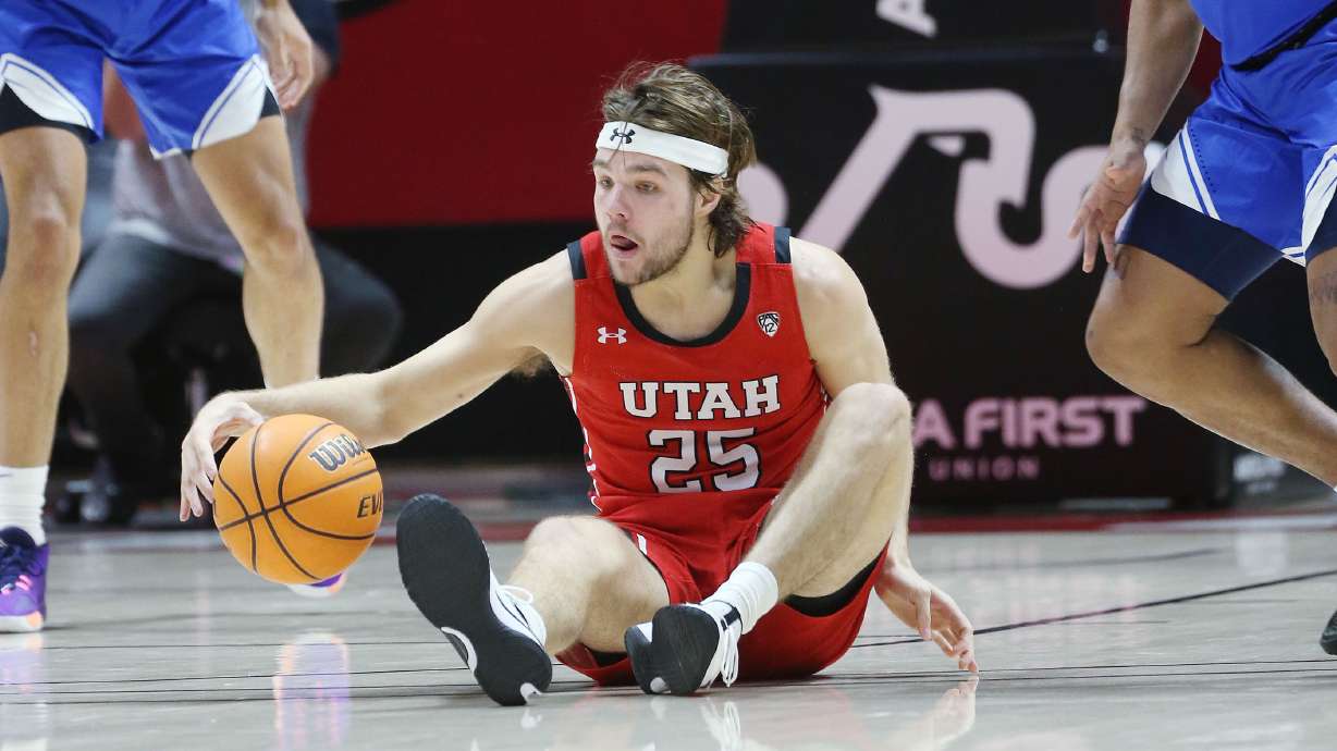 Utah Utes guard Rollie Worster (25) keeps his dribble in Salt Lake City on Saturday, Nov. 27, 2021. BYU won 75-64.