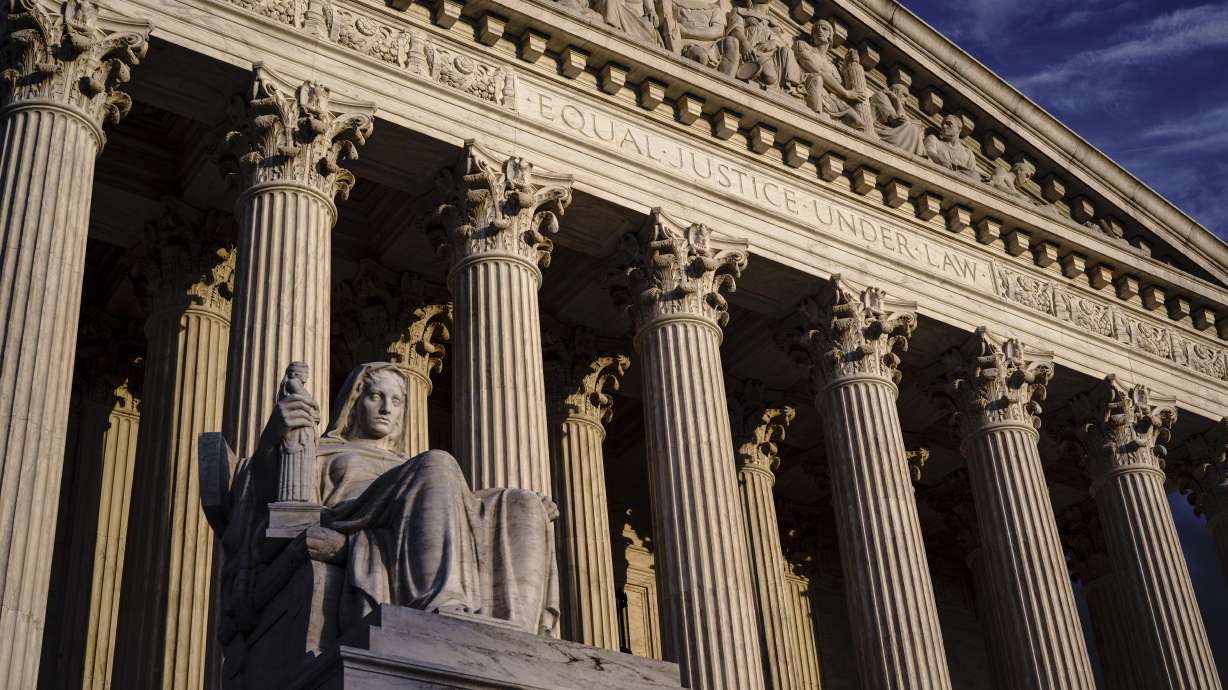 The Supreme Court is seen at dusk in Washington, Oct. 22.