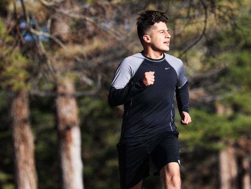 Mohammad Tamim Solhadost, a recent refugee from Afghanistan, goes through a short workout at Liberty Park in Salt
Lake City on Wednesday, Nov. 17, 2021. He hopes to pursue a professional soccer career.