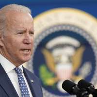 New omicron COVID variant cause for concern, not panic, Biden tells US