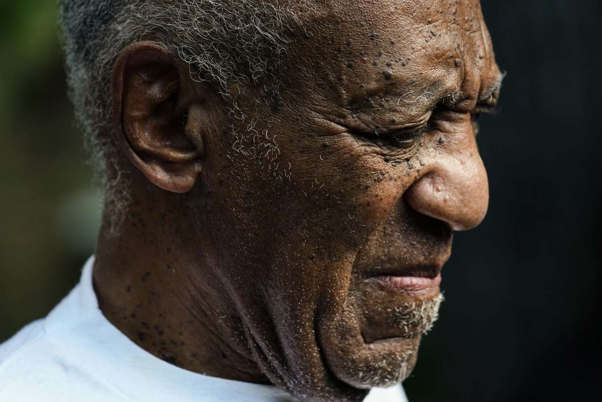 Bill Cosby listens to members of his team speak during a news conference outside his home in Elkins Park, Pa., on June 30, after being released from prison. Prosecutors asked the U.S. Supreme Court to review the decision that overturned Cosby’s conviction. In a petition filed Monday, they wrote that courts should not equate a supposed promise made by a former prosecutor to lifetime immunity.