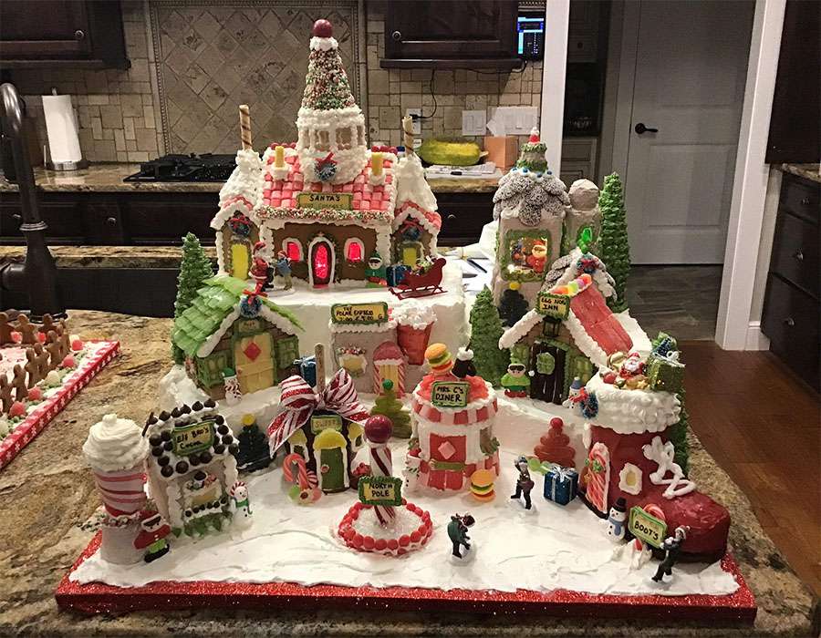 A gingerbread house representing Santa’s workshop made by Geri Hansen.
