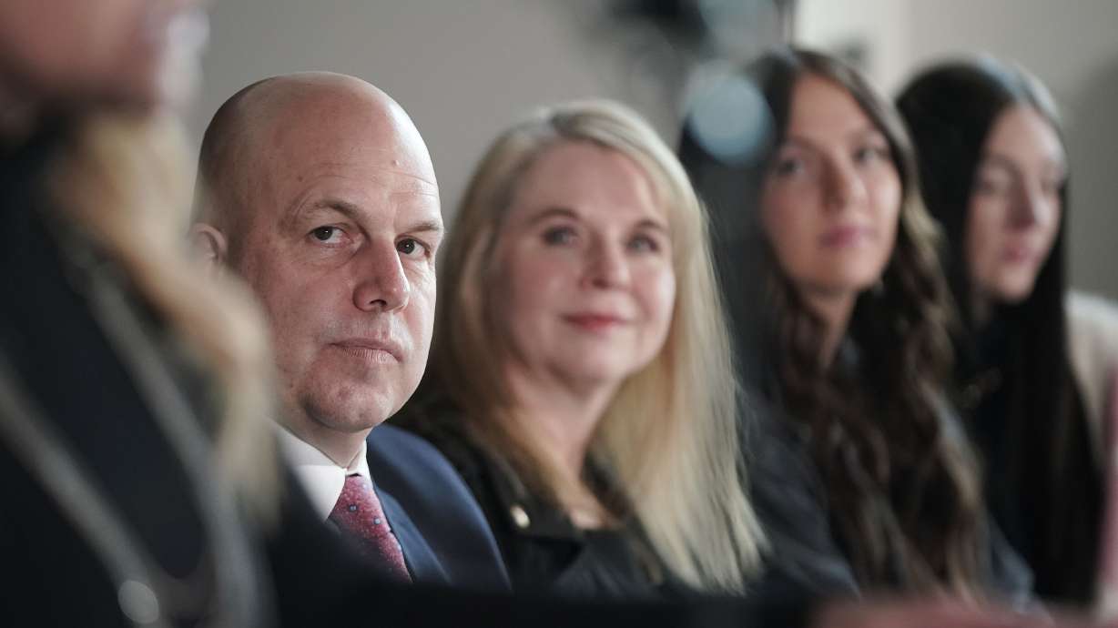 New Provo Police Chief Fred Ross and his family listen as his new position is announced in Provo on Tuesday.