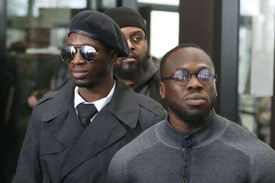 Brothers Olabinjo Osundairo, right, and Abimbola Osundairo, appear outside the Leighton Criminal Courthouse in Chicago, Feb. 24, 2020.
