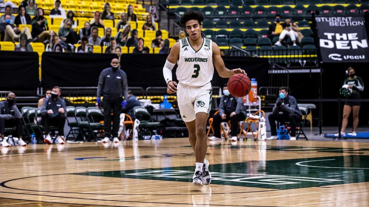 Utah Valley point guard Blaze Nield brings the ball up the court during a game in the 2020-21 season, when Lehi product played through injuries that required double hip surgery over the summer.