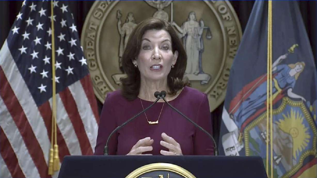 In this image from video provided by the New York Office of the Governor, New York Gov. Kathy Hochul speaks during a news briefing, in New York, Thursday. Minnesota health officials on Thursday reported the state's first confirmed case of the omicron COVID-19 variant, in a man who had attended an anime conference in New York City in late November.