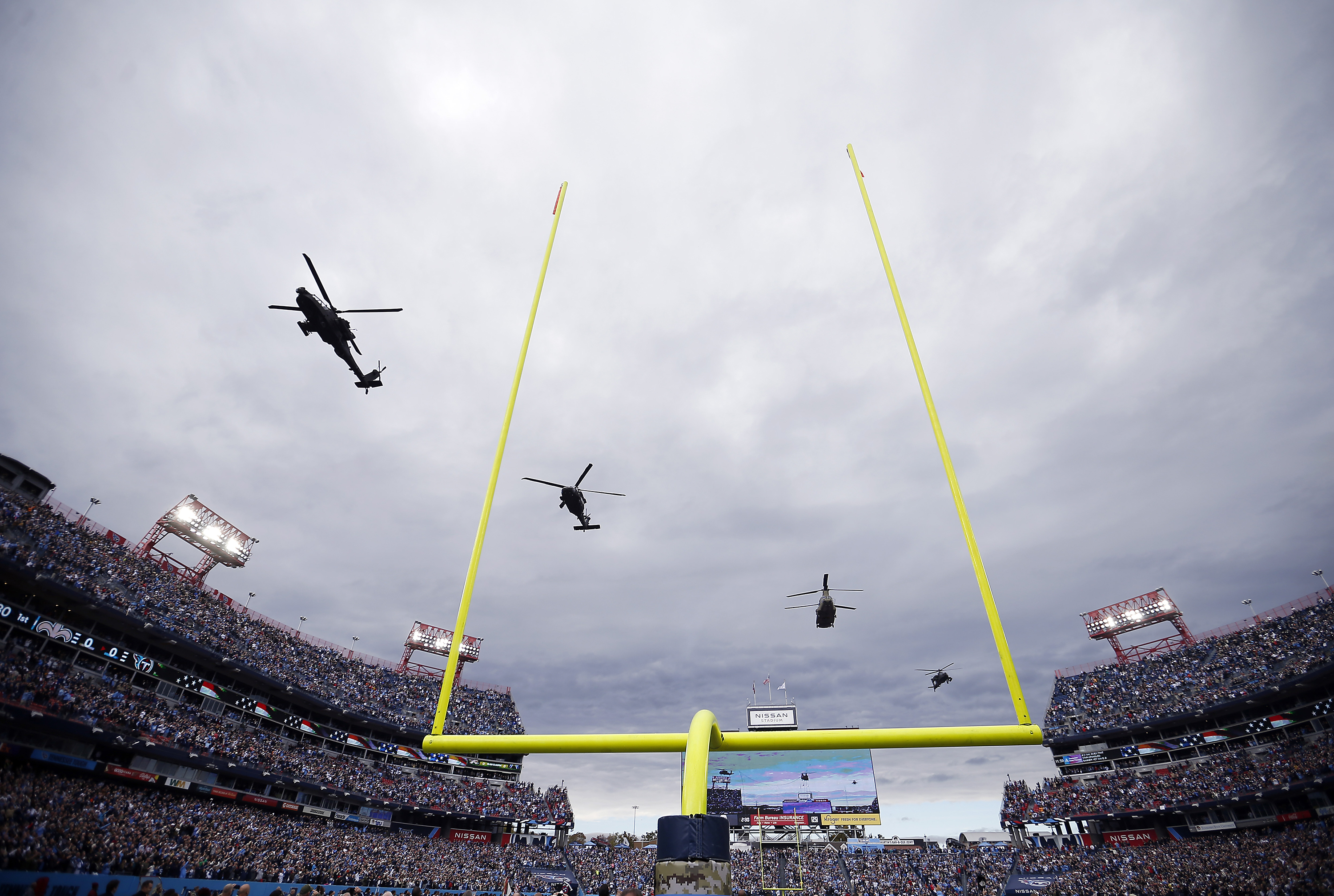 A helicopter flyover before the game between the New Orleans Saints and the Tennessee Titans at Nissan Stadium on Nov. 14, in Nashville, Tennessee.