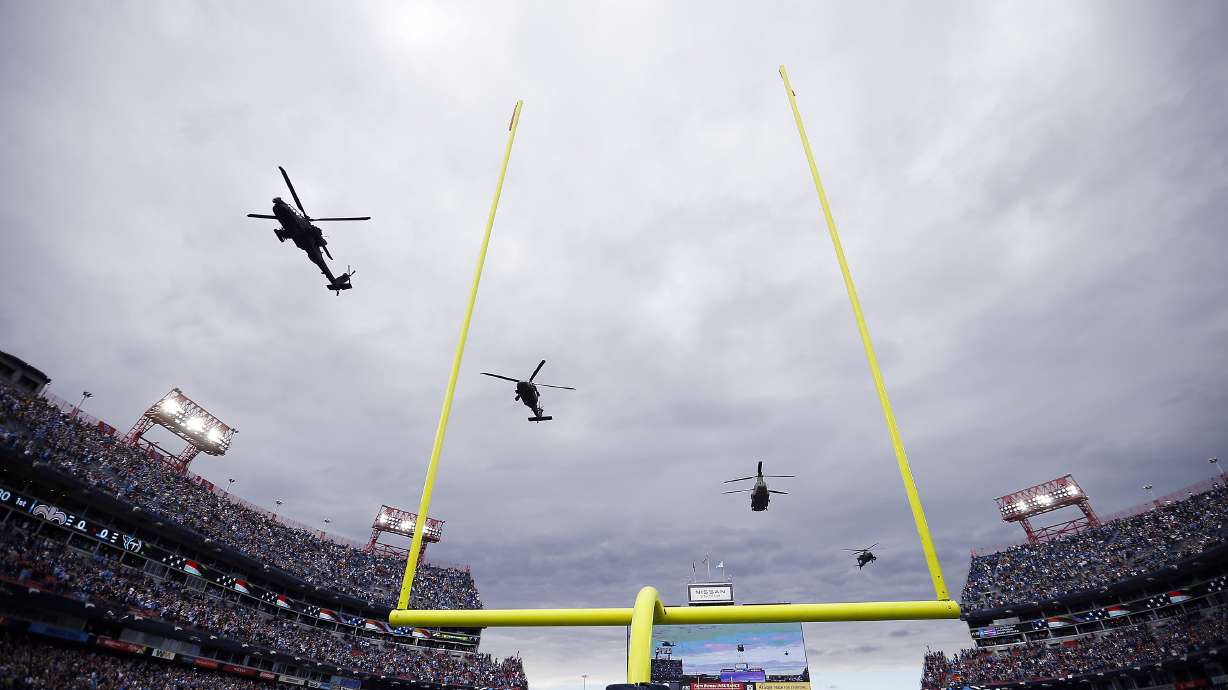 A helicopter flyover before the game between the New Orleans Saints and the Tennessee Titans at Nissan Stadium on Nov. 14, in Nashville, Tennessee.