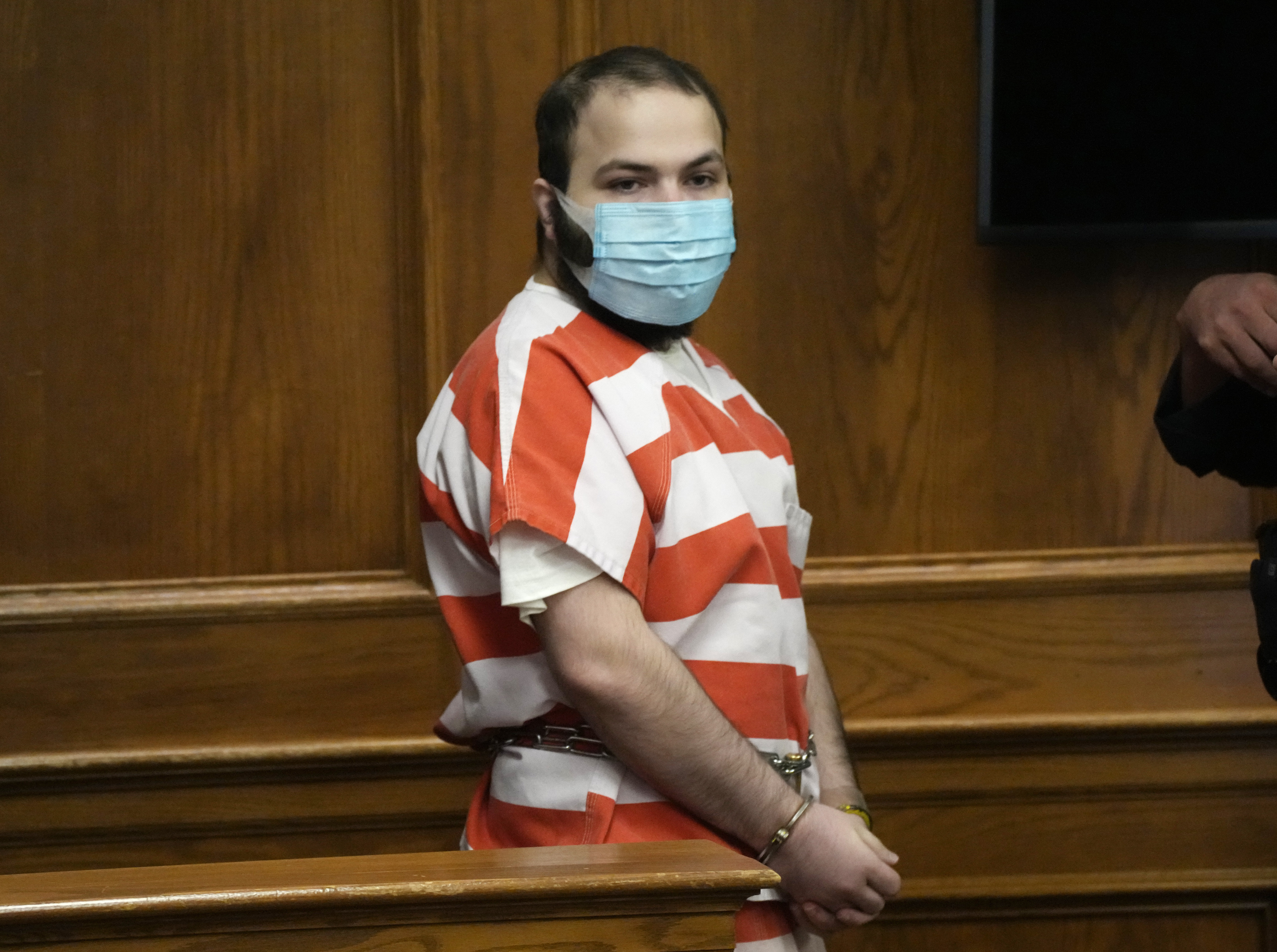 Ahmad Al Aliwi Alissa, accused of killing 10 people at a Colorado supermarket in March, is led into a courtroom for a hearing Sept. 7 in Boulder, Colo. Experts have found Alissa is mentally incompetent to proceed in the case, attorneys said on Friday.
