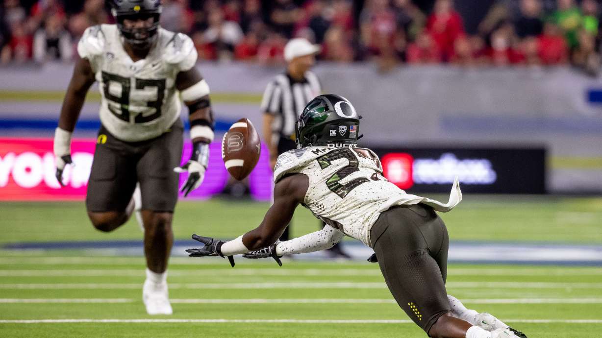 Oregon Ducks safety Marko Vidackovic (27) intercepts a Utah pass during the Pac-12 championship game at Allegiant Stadium in Las Vegas on Friday, Dec. 3, 2021.