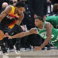 Near-record shooting helps save Jazz from a strange night against Boston