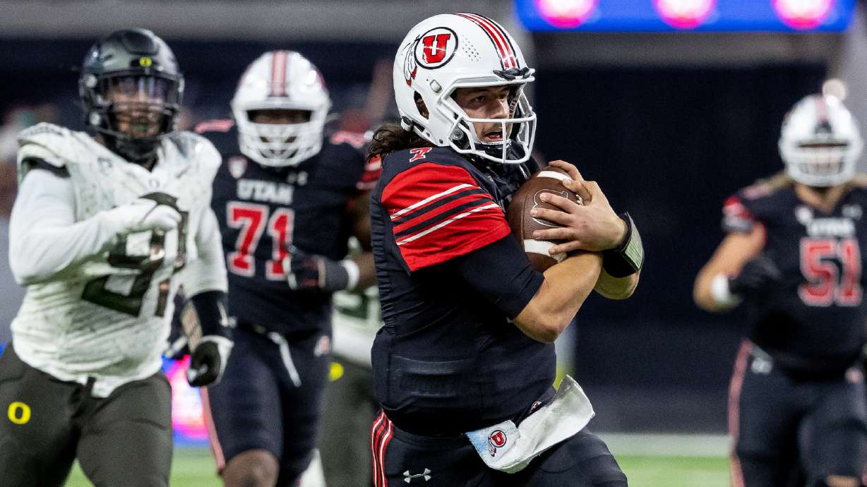 Utah Utes quarterback Cam Rising (7) runs the ball during the Pac-12 championship game against the Oregon Ducks at Allegiant Stadium in Las Vegas on Friday, Dec. 3, 2021.