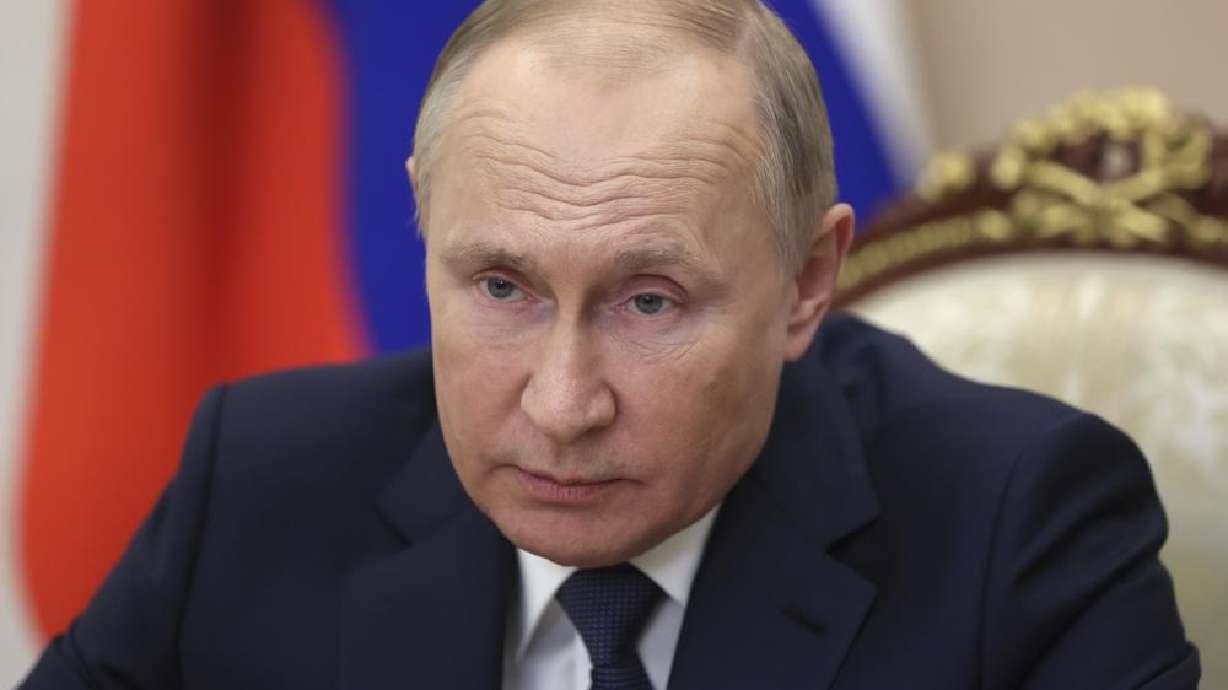 Russian President Vladimir Putin holds a video conference to address participants in a congress of the United Russia party marking the 20th anniversary of the party founding, in Moscow, Russia, Saturday.