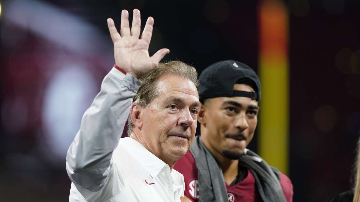 Alabama head coach Nick Saban waves to fans after the Southeastern Conference championship NCAA college football game between Georgia and Alabama, Saturday, Dec. 4, 2021, in Atlanta. Alabama won 41-24.