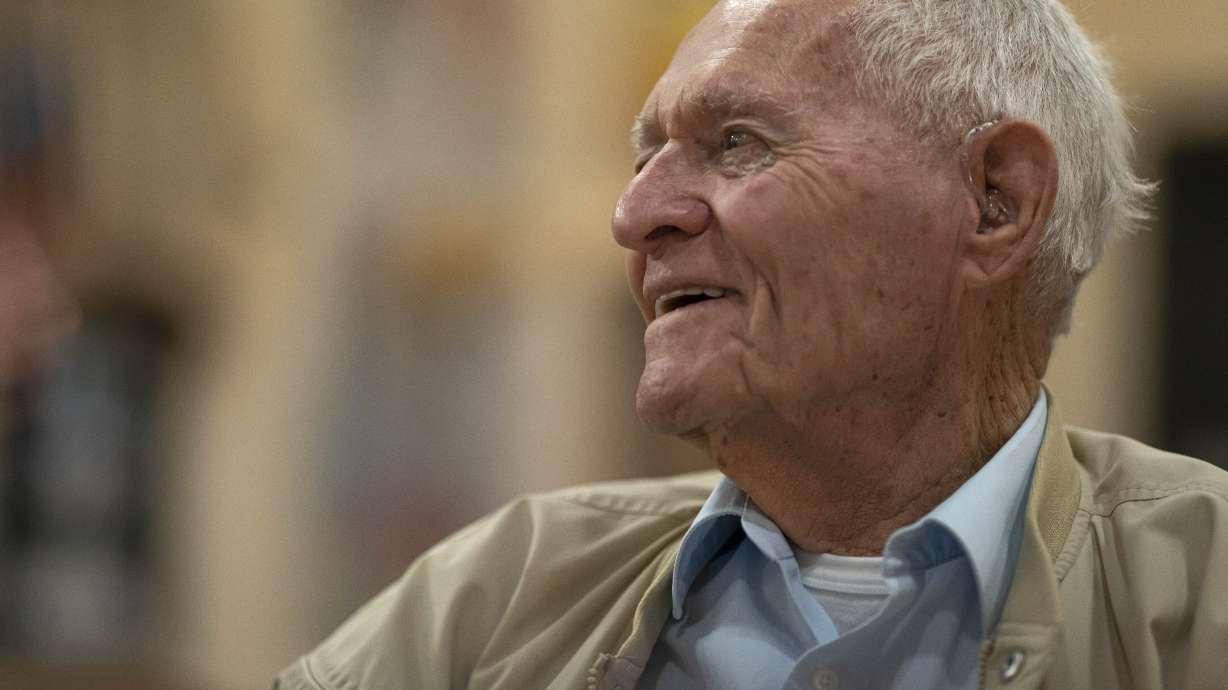 Pearl Harbor survivor and World War II Navy veteran David Russell, 101, talks with fellow veterans while eating breakfast at the American Legion Post 10 on Monday, Nov. 22, 2021, in Albany, Ore. When Japanese bombs began falling on Pearl Harbor, the 1st Class Seaman sought refuge below deck on the USS Oklahoma.