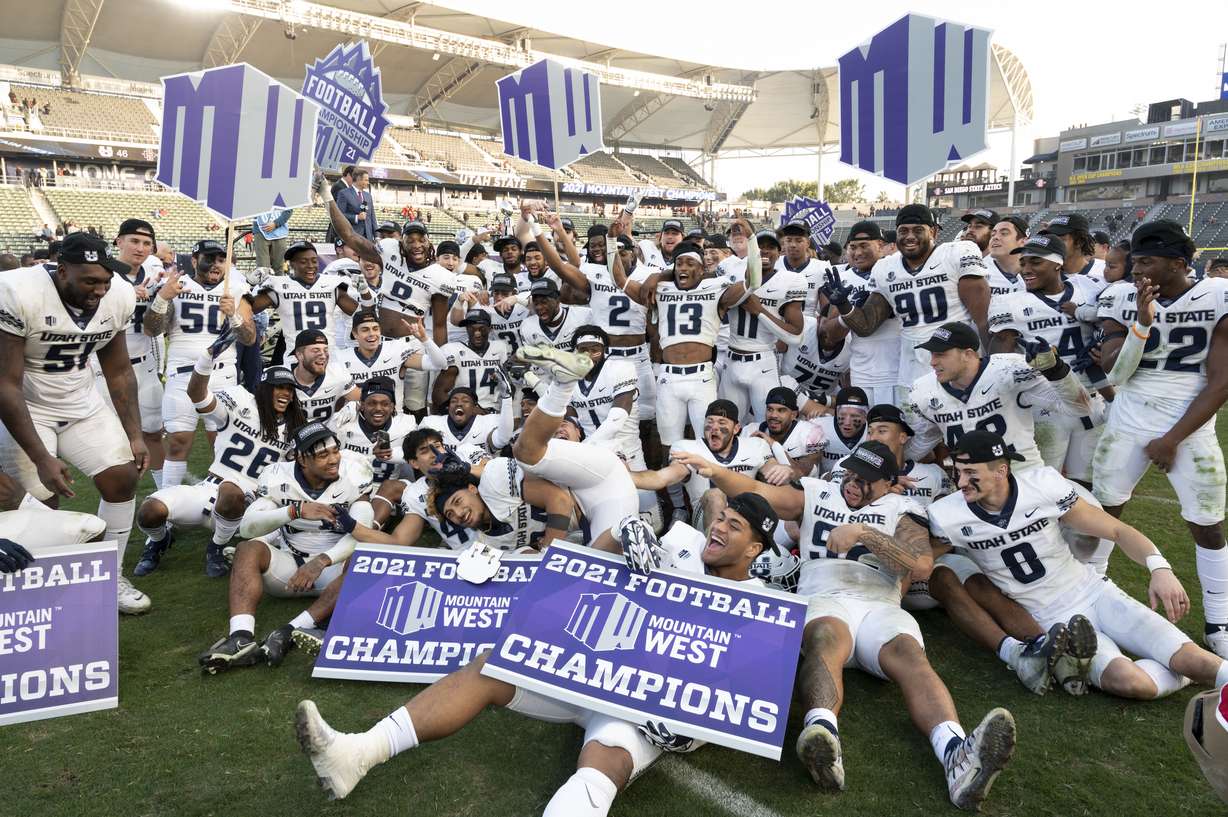 Utah State celebrates after defeating San Diego State during an NCAA college football game for the Mountain West Conference Championship, Saturday, Dec. 4, 2021, in Carson, Calif.