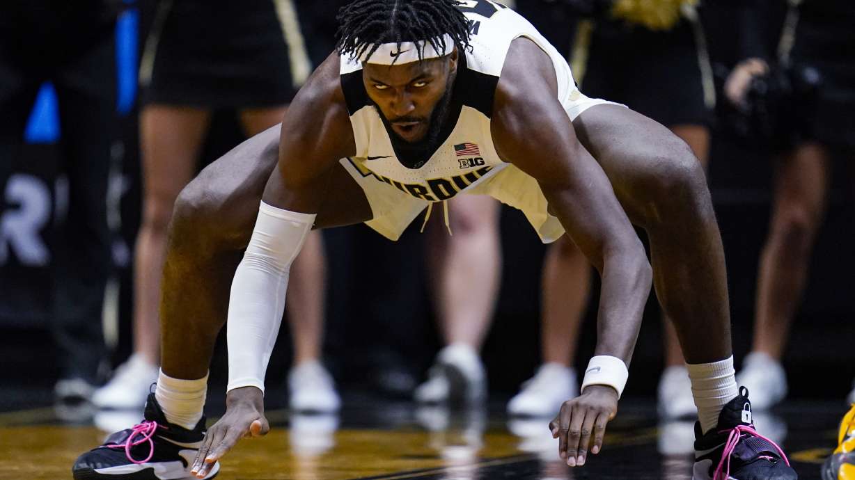 Purdue forward Trevion Williams celebrates after a basket against Iowa during the second half of an NCAA college basketball game in West Lafayette, Ind., Friday, Dec. 3, 2021. Purdue won 77-70.