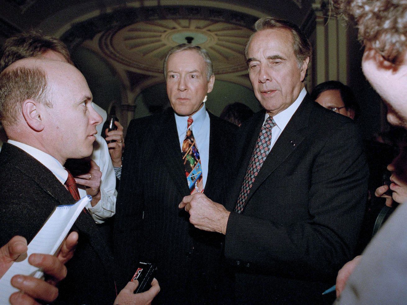 Senate Majority Leader Bob Dole of Kansas, right, and Sen. Orrin Hatch (R-Utah), meet reporters on Capitol Hill in Washington, Feb. 28, 1995, after attending a Republican Caucus. Utah leaders are taking to the internet to share stories or lessons learned from the senator.