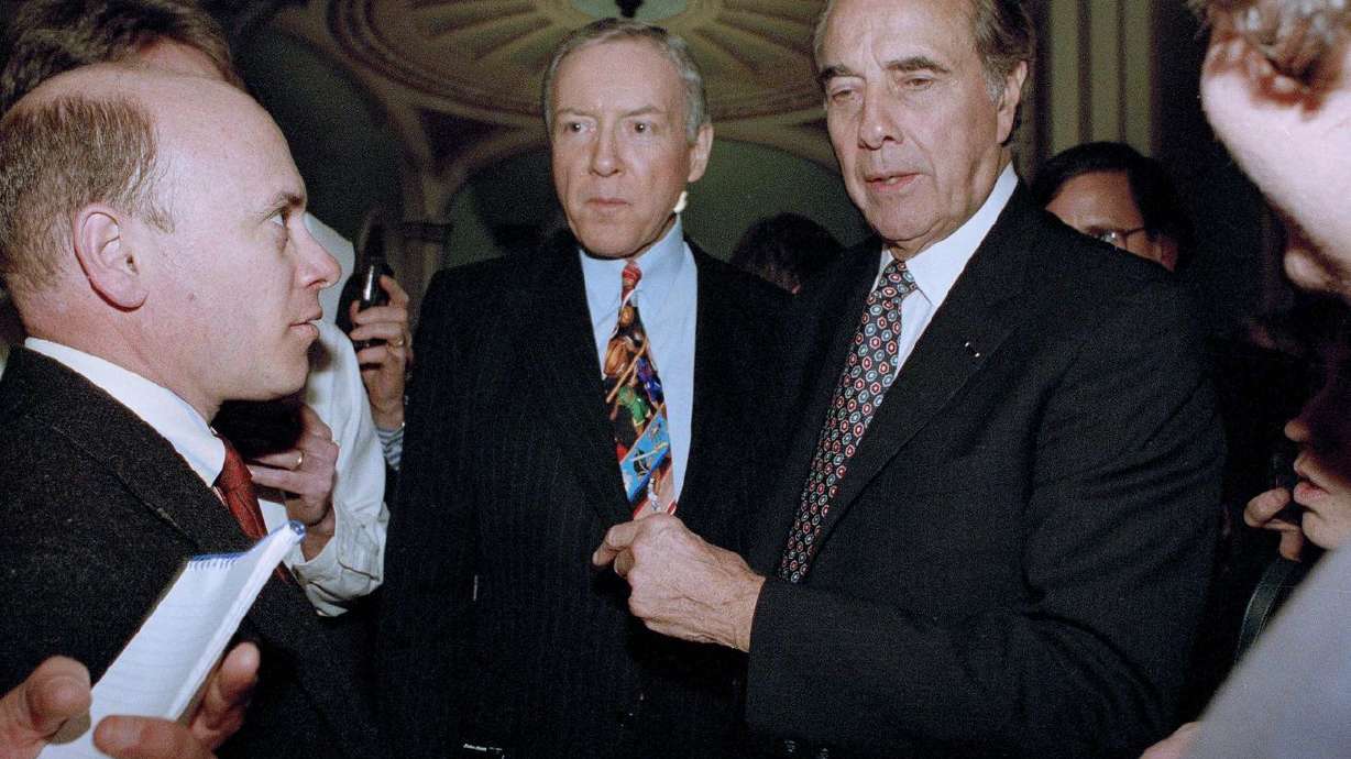 Senate Majority Leader Bob Dole of Kansas, right, and Sen. Orrin Hatch (R-Utah), meet reporters on Capitol Hill in Washington, Feb. 28, 1995, after attending a Republican Caucus. Utah leaders are taking to the internet to share stories or lessons learned from the senator.