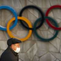 Neither omicron variant nor US diplomatic boycott will stop Beijing Olympics, IOC says