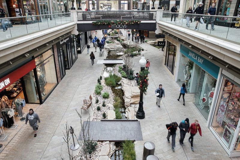 Shoppers walk through City Creek Center in Salt Lake
City on Wednesday.