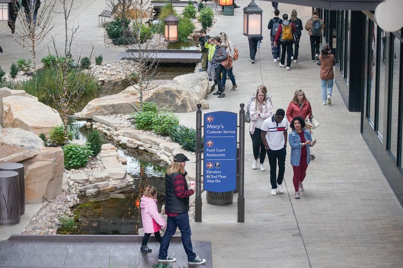 Shoppers walk through City Creek Center in Salt Lake
City on Wednesday.