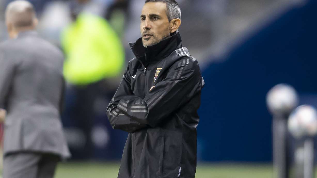Real Salt Lake interim head coach Pablo Mastroeni watches the run of play during the first half of an MLS soccer match against Sporting Kansas City Sunday, Nov. 7, 2021, in Kansas City, Kan.