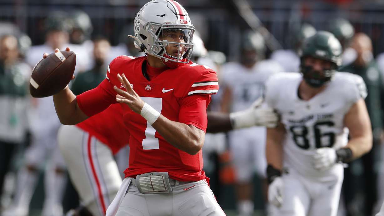 Ohio State quarterback C.J. Stroud drops back to pass against Michigan State during the first half of an NCAA college football game Saturday, Nov. 20, 2021, in Columbus, Ohio.
