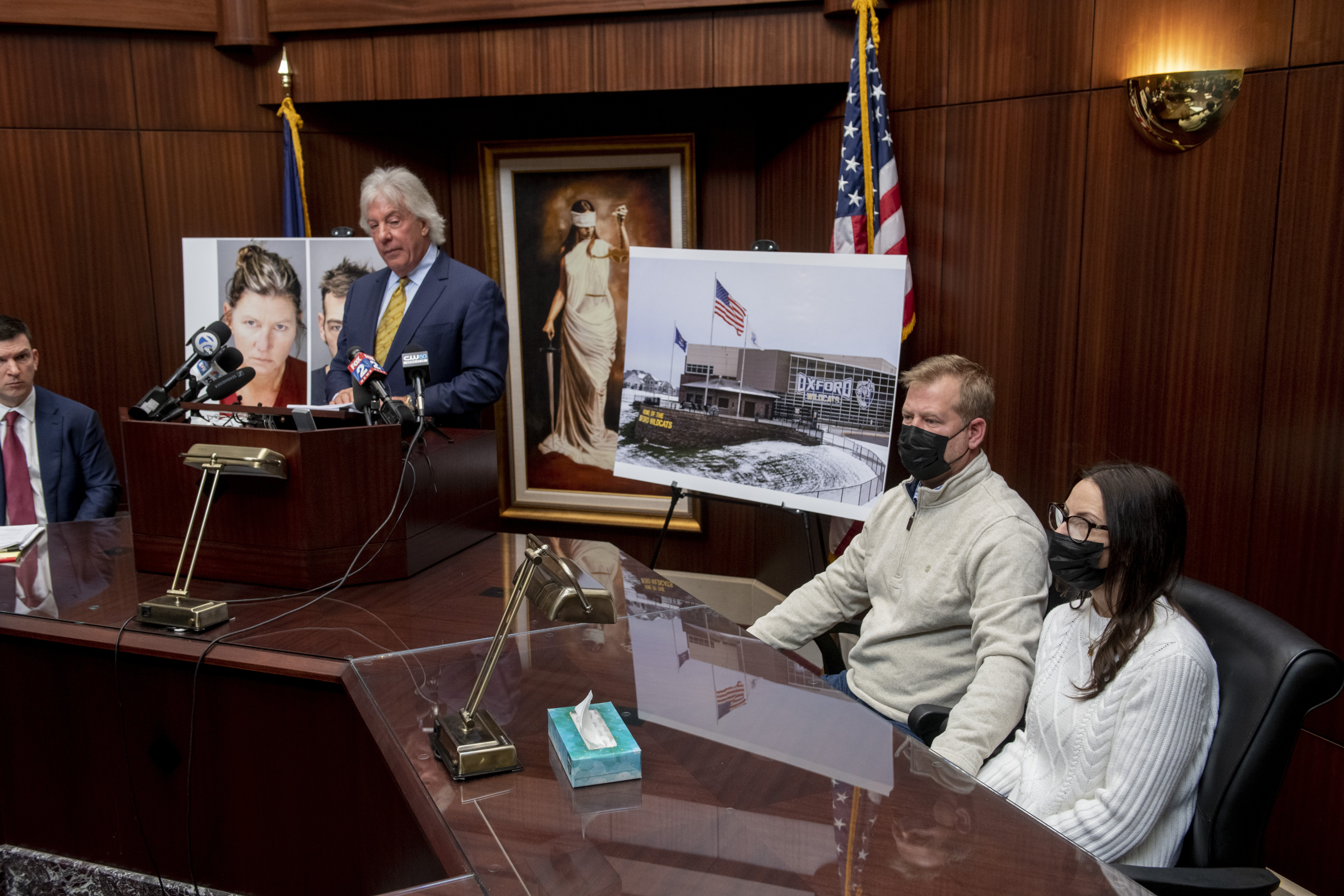 Jeffrey Franz and his wife Brandi listen as attorney Geoffrey Fieger holds a news conference at his offices in Southfield, Mich., Thursday.
