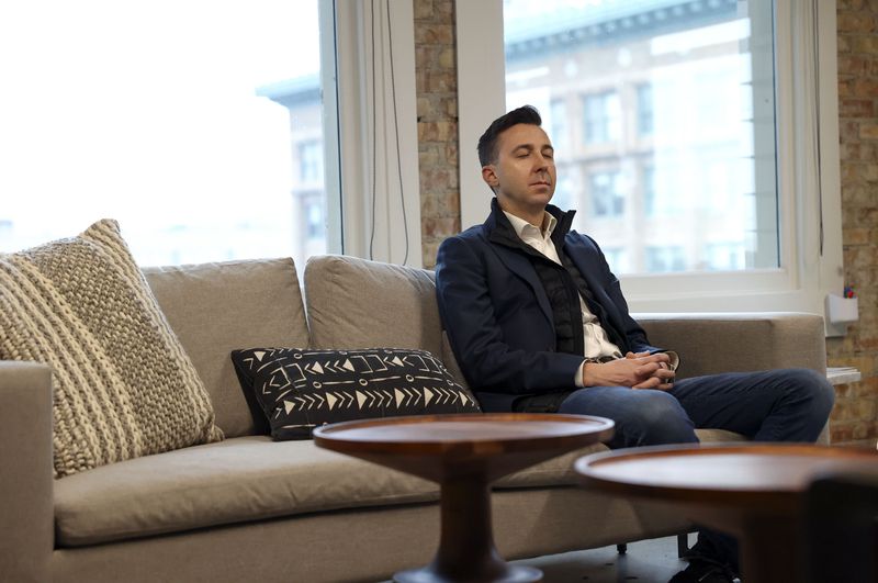 Ryan Westwood, Simplus CEO, meditates between meetings
in his office in Salt Lake City on Thursday.