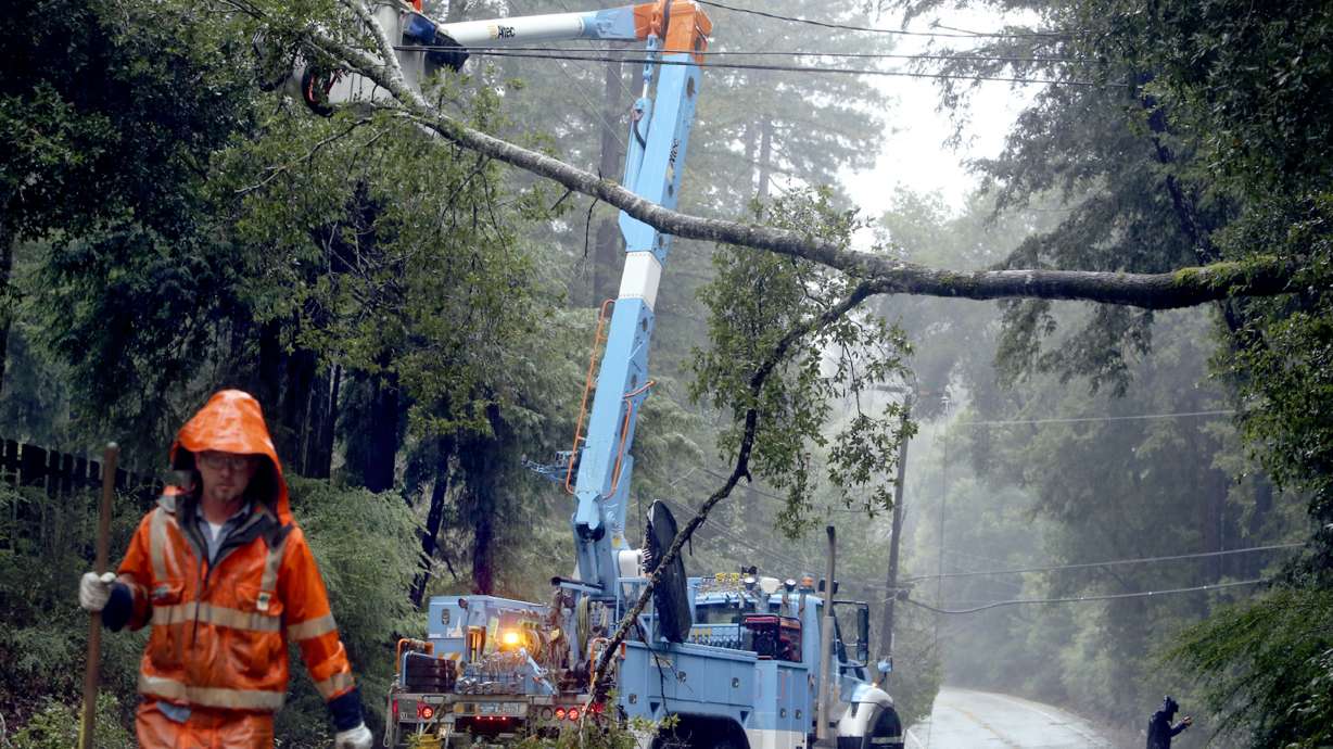 A storm promises to drop up to 8 feet of snow on the highest peaks and drench other parts of California. PG&E sent crews Saturday to clear vegetation away from power lines to reduce the chance of power outages.