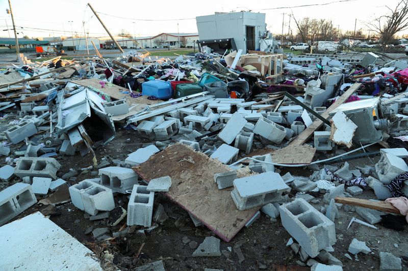 Damage and debris is seen Sunday after a devastating outbreak of tornadoes ripped through Bowling Green Kentucky.