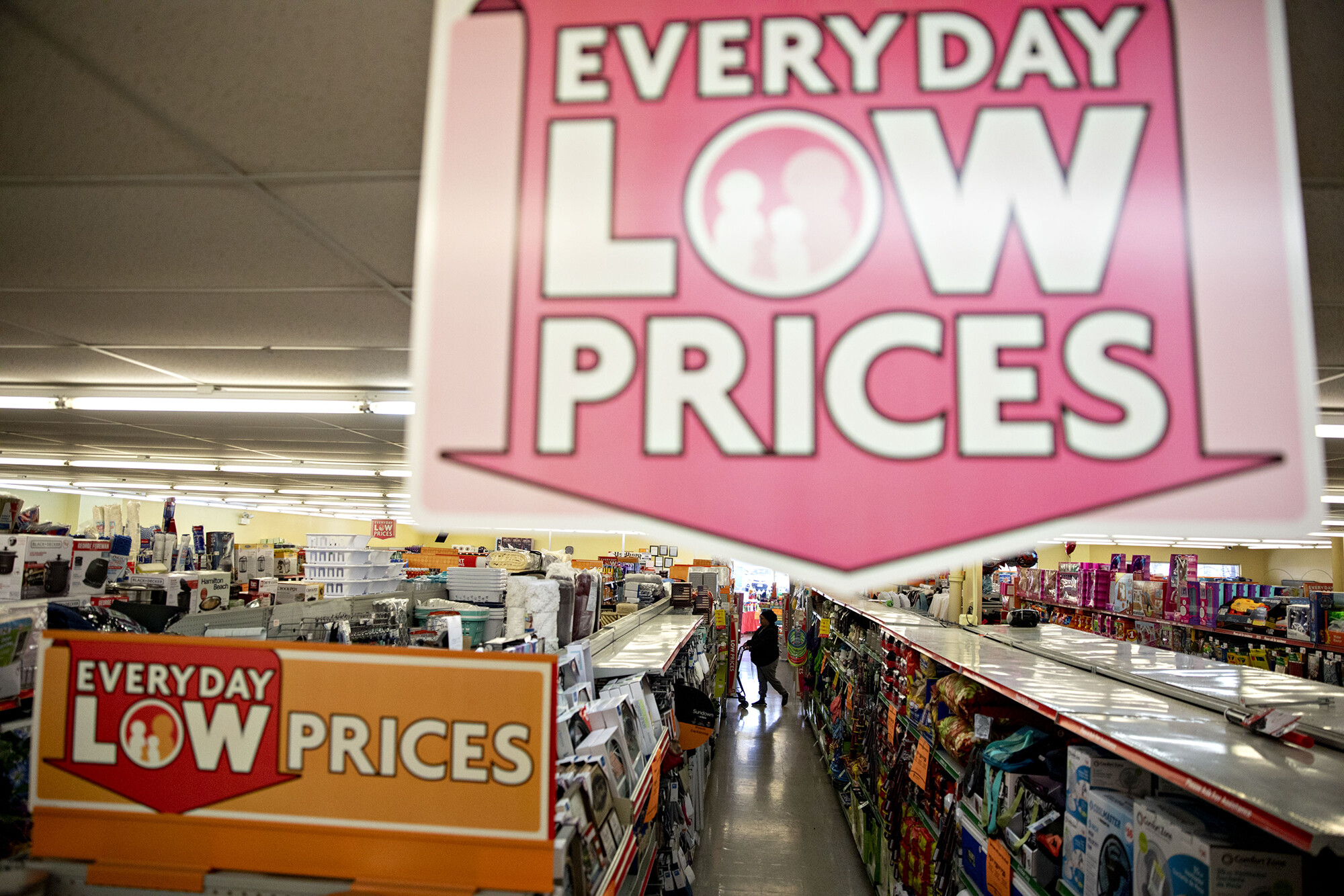 Signage is displayed inside a Family Dollar Stores store in Chicago on March 3, 2020. Many of America's leading discount chains have sat out the online shopping boom. Not anymore.