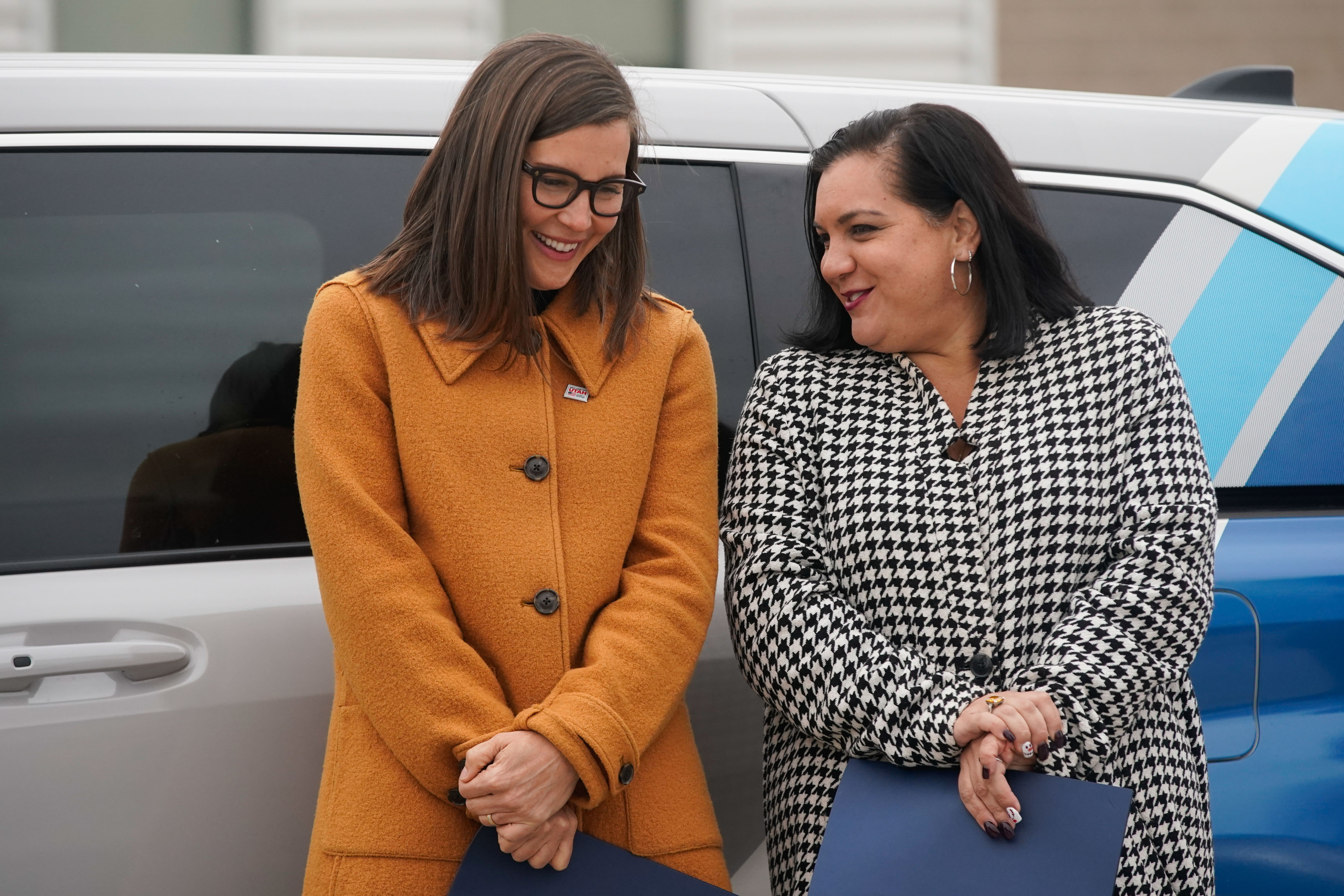 Salt Lake City Mayor Erin Mendenhall, left, and Salt Lake City Councilwoman Victoria Petro-Eschler chat during an event at the Northwest Community Center in Salt Lake City on Monday, to launch UTA On Demand for west-side neighborhoods.