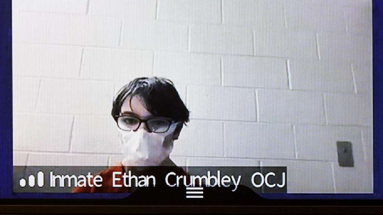 Ethan Crumbley appears on video from the Oakland County Jail at 52nd District Court in Rochester Hills, Mich., Monday. Crumbley, 15, is charged as an adult with murder, terrorism and other counts for the Nov. 30 shooting at Oxford High School.