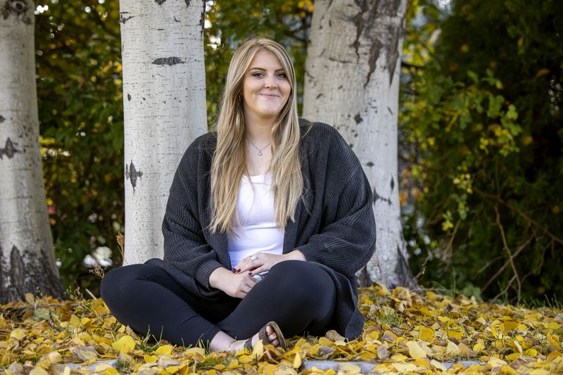 Alexa Minson poses for photos at her home in Orem on
Tuesday, Nov. 2.