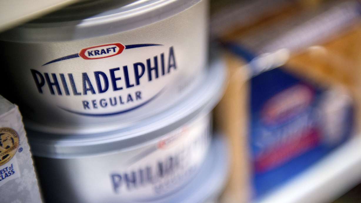 Kraft Foods Philadelphia cream cheese tubs are arranged in Fog Hill Market in San Francisco, California, U.S., on Tuesday, Feb. 5, 2013.