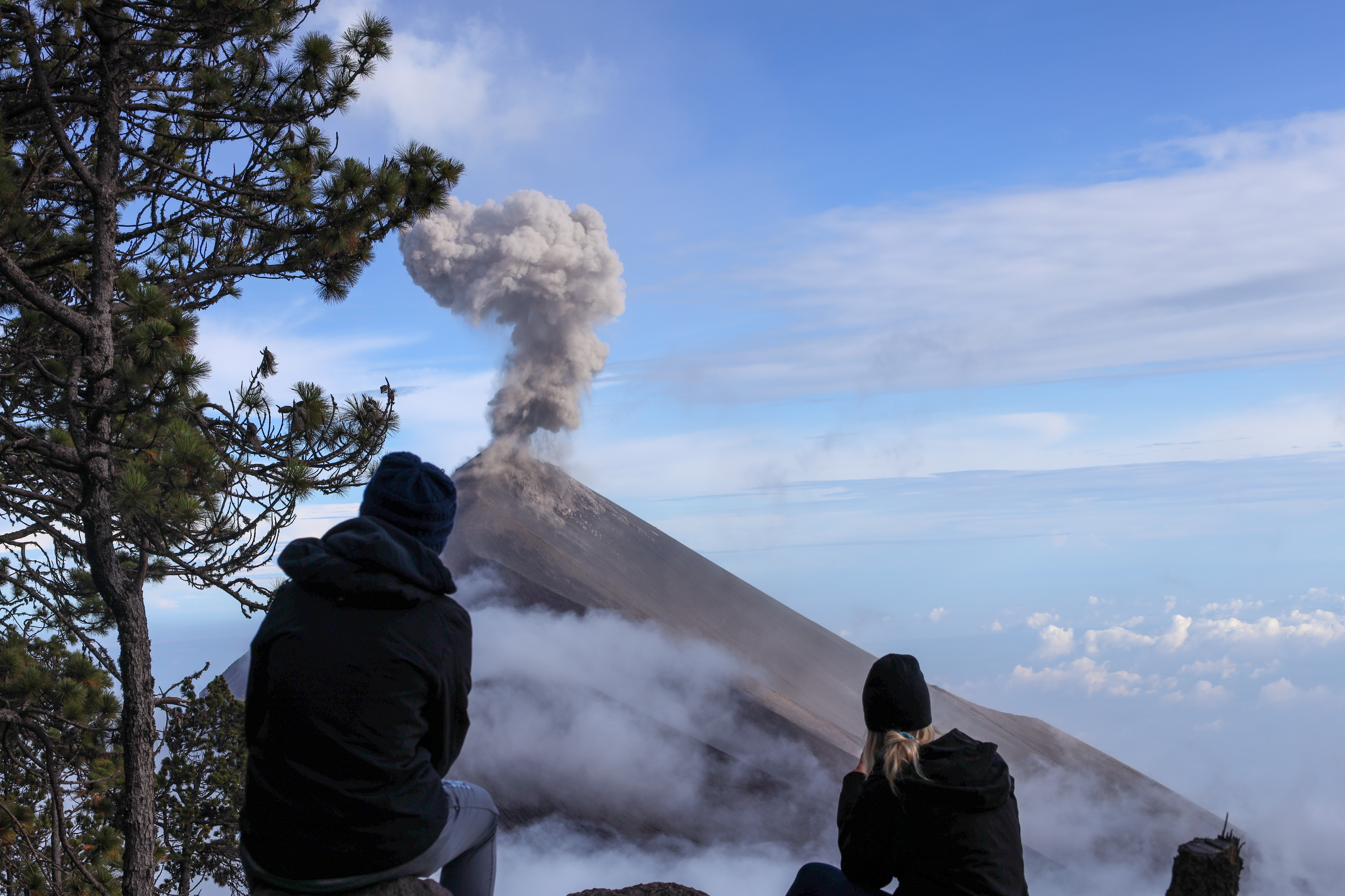 Two participants overlook a volcano in Guatemala during a Youth Wilderness Experience Trip.