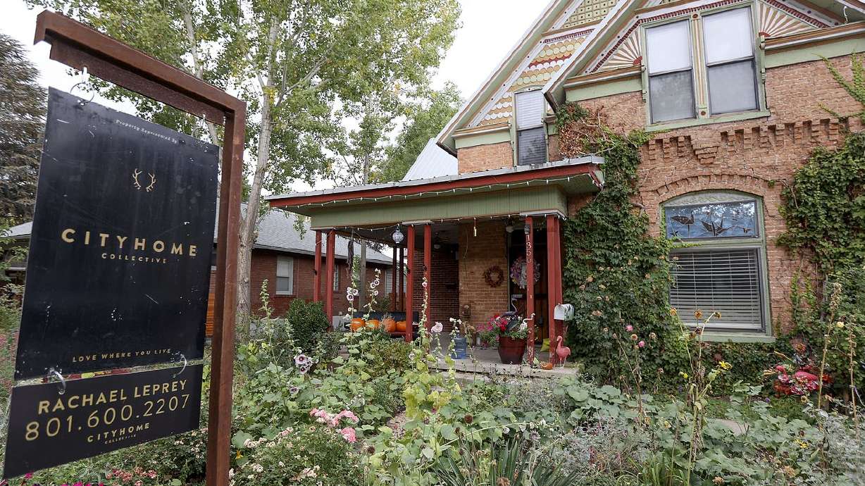 A "for sale” sign is pictured in Salt Lake City, Oct. 18. A new study suggests home prices are "poised to flatten” in five of the "most overvalued markets” in the nation. Those markets include three cities in Utah.
