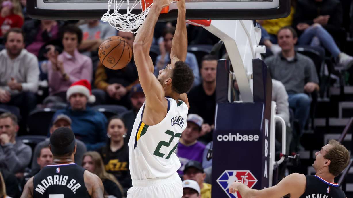 Utah Jazz center Rudy Gobert (27) dunks during the game against the LA Clippers at Vivint Arena in Salt Lake City on Wednesday, Dec. 15, 2021.