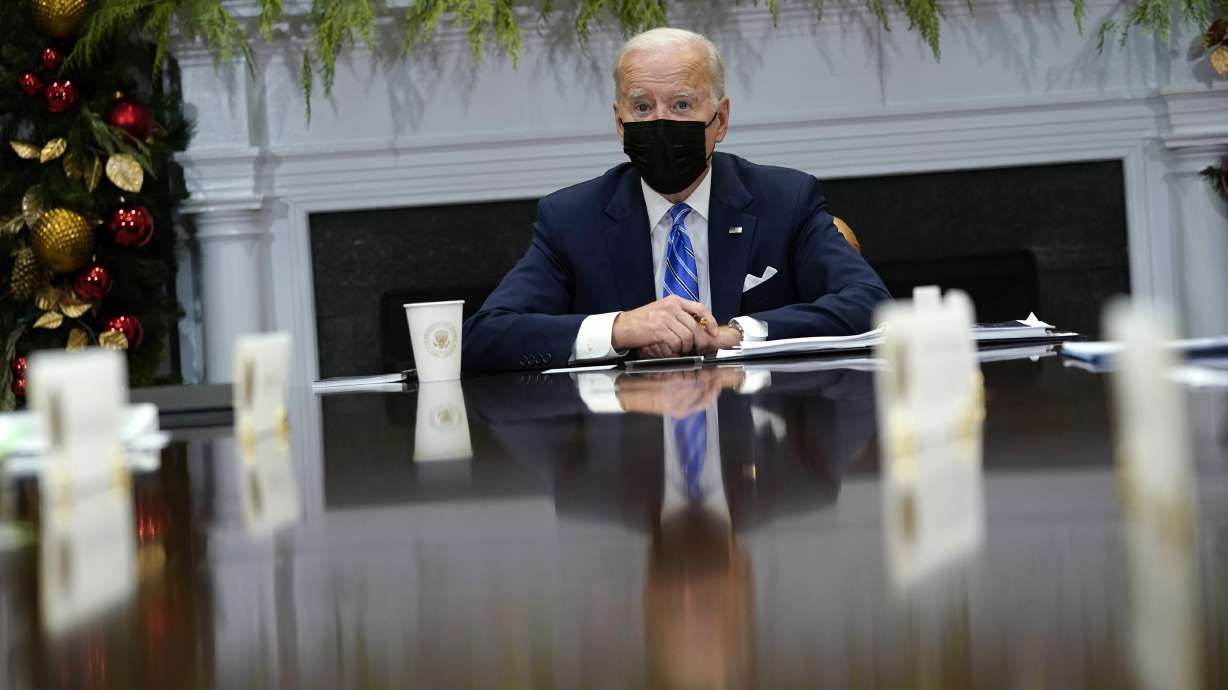 President Joe Biden meets with members of the White House COVID-19 Response Team in Washington Thursday. He has all but acknowledged negotiations over his sweeping domestic policy package will likely push into the new year.