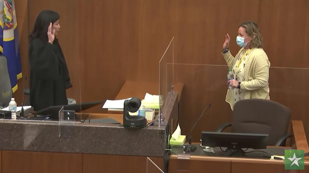 In this screen grab from video, Hennepin County Judge Regina Chu left, swears in former Brooklyn Center Police Officer Kim Potter before she testifies in court Friday at the Hennepin County Courthouse in Minneapolis, Minn. Potter is charged with first and second-degree manslaughter in the April 11 shooting of Daunte Wright, a 20-year-old Black motorist, following a traffic stop in the Minneapolis suburb of Brooklyn Center.