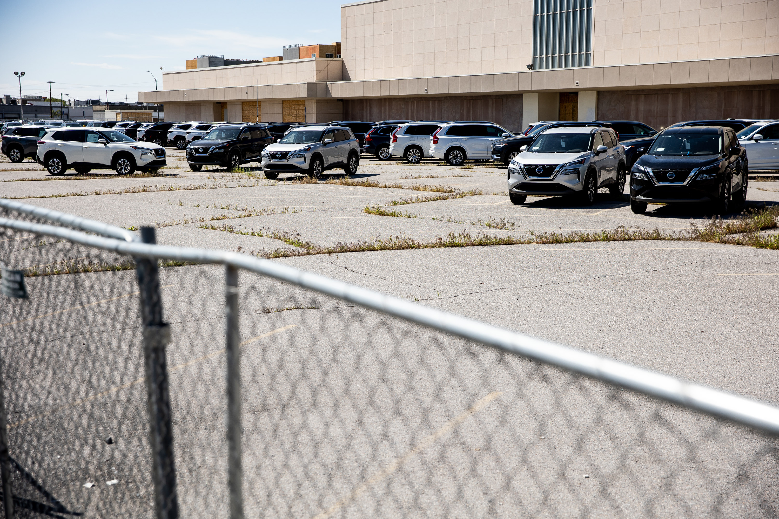 Cars for sale are stored in the old Sears parking lot in Salt Lake City on May 13. Intermountain Healthcare confirmed Friday it has purchased the old Sears building.