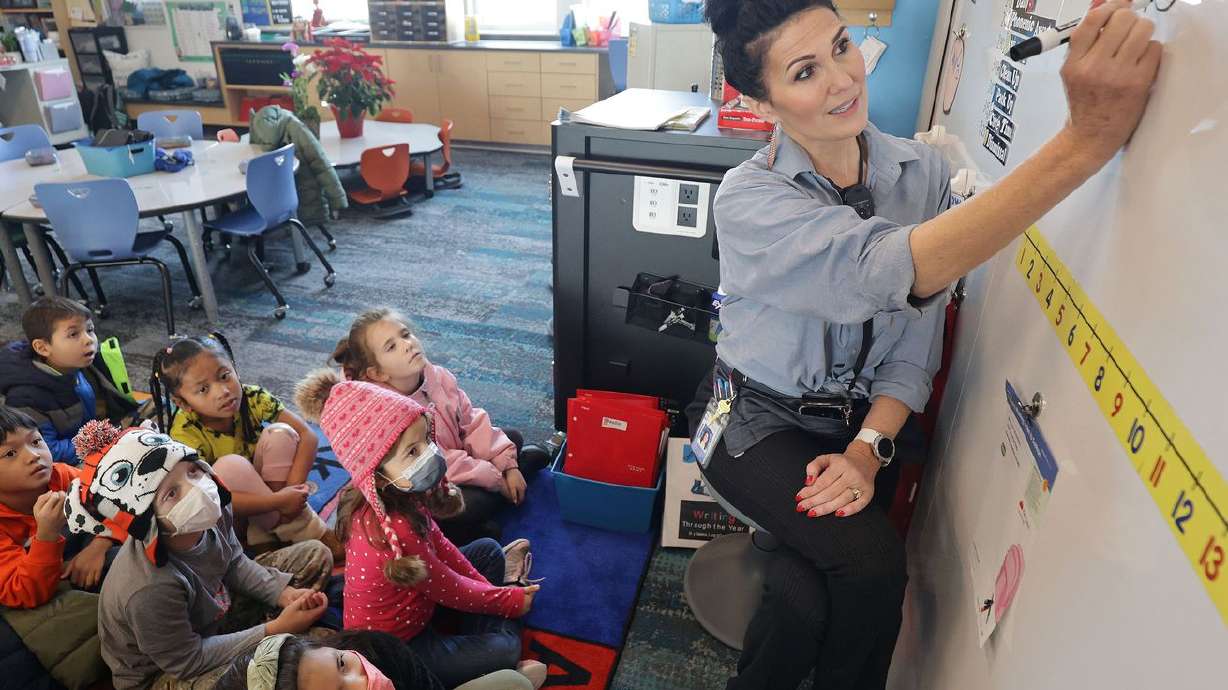 Tiffany Hatch, a first grade teacher at South
Clearfield Elementary in Clearfield, teaches math to her class on
Wednesday.