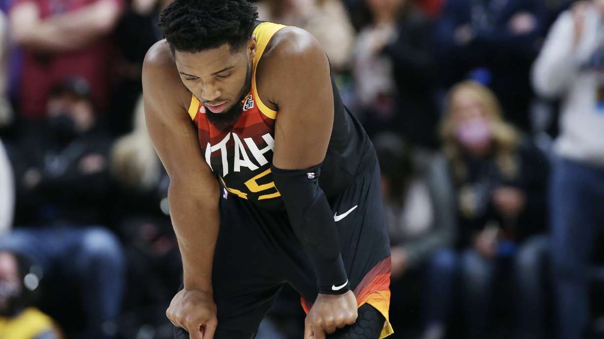 Utah Jazz guard Donovan Mitchell (45) misses a shot near the end of the game at Vivint Arena in Salt Lake City on Friday, Dec. 17, 2021. The Spurs won 128-126.