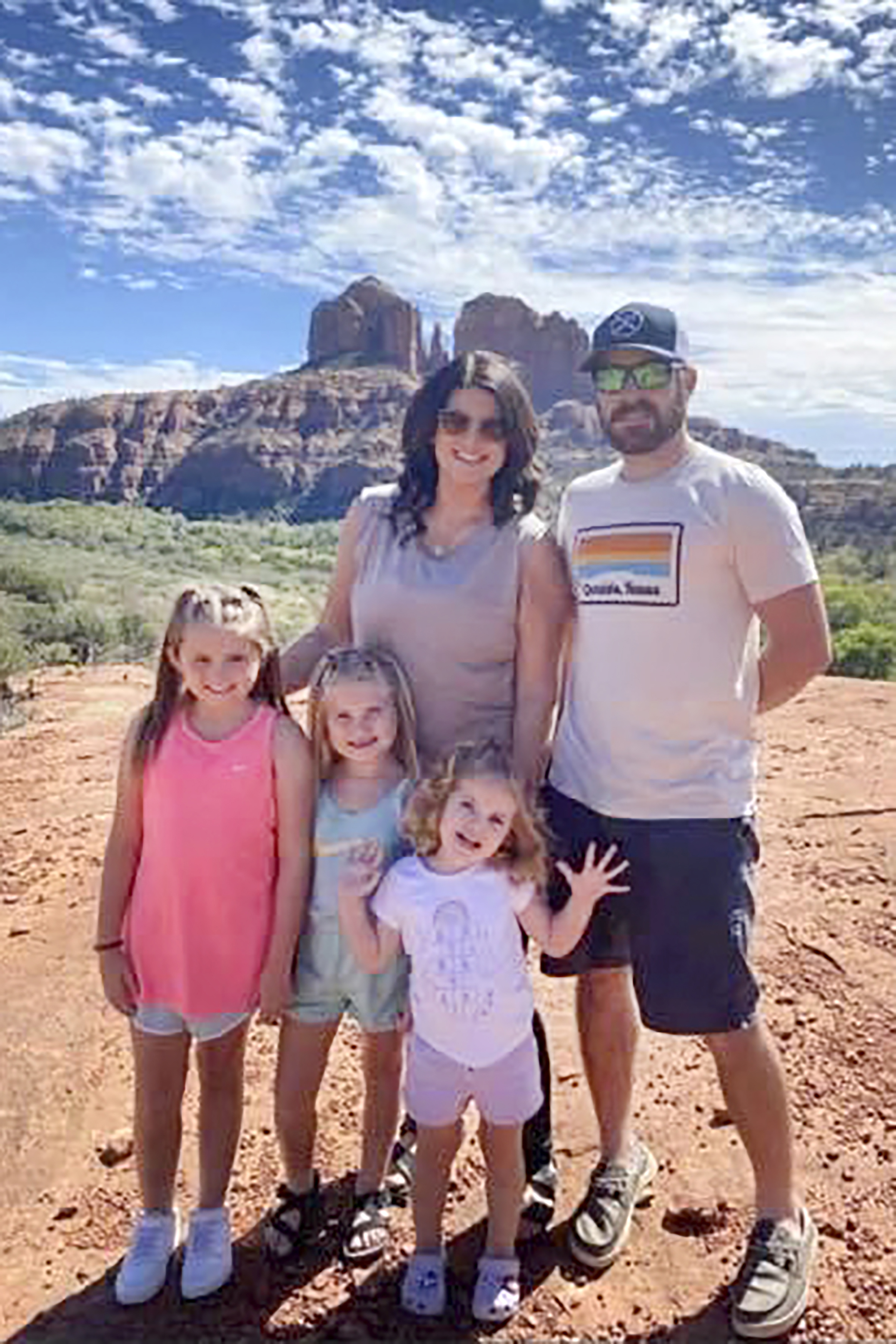 In this undated photo provided by Sandra Hooker, the Rackley family poses for a picture while on a trip to Sedona, Arizona. From left are, Annistyn, 9, Avalinn, 7, Alanna, 3, and their parents, Megan and Trey. Annistyn, who loved swimming, dancing and cheerleading, was among dozens of people who died because of a severe storm Dec. 10. A tornado hit her home and splintered it less than a week after the family had moved in.