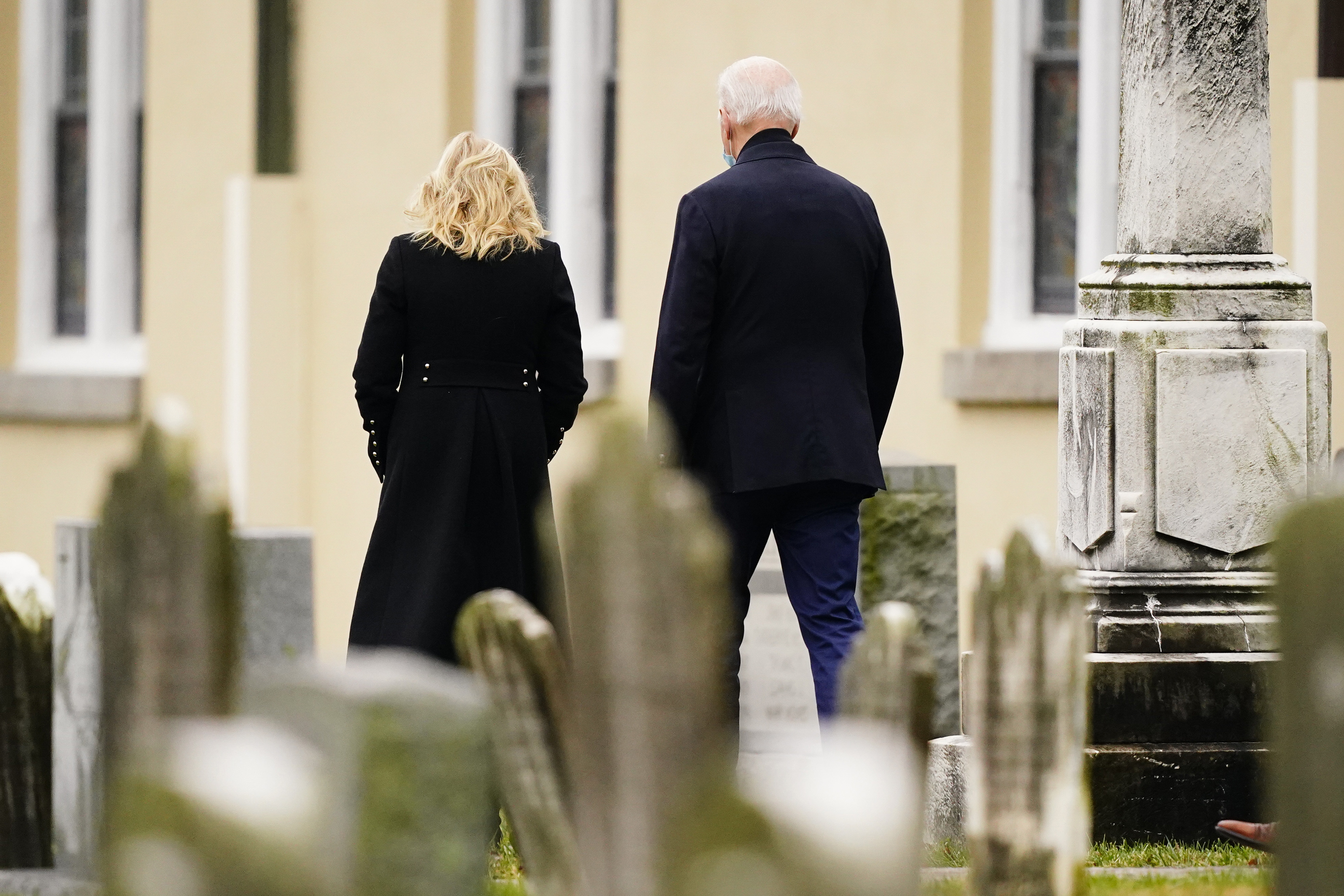 President Joe Biden and first lady Jill Biden walk from St. Joseph on the Brandywine Catholic Church in Wilmington, Del., Saturday, Dec. 18, 2021.