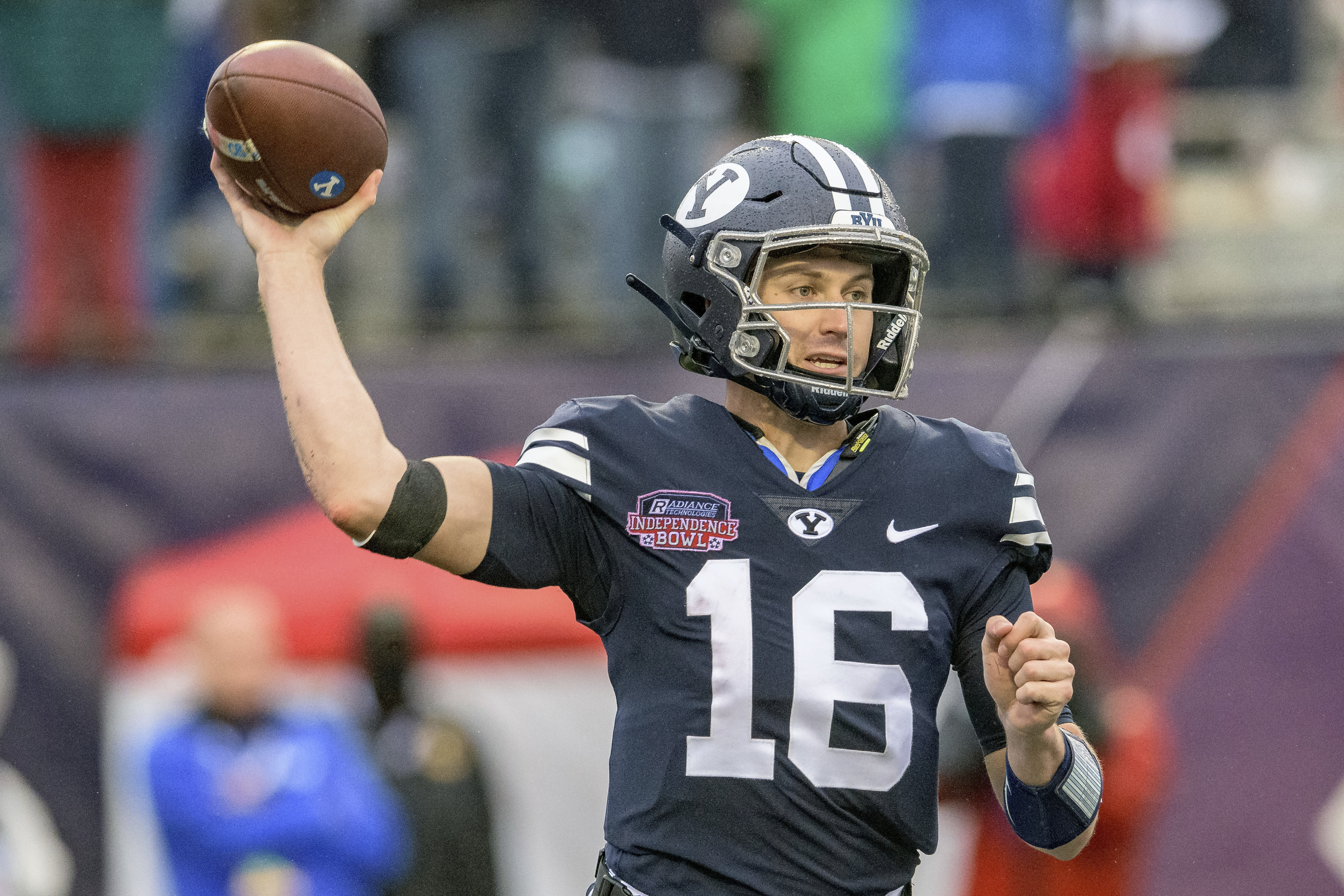 BYU quarterback Baylor Romney (16) looks to throw during the first half of the Independence Bowl NCAA college football game against UAB in Shreveport, La., Saturday, Dec. 18, 2021.