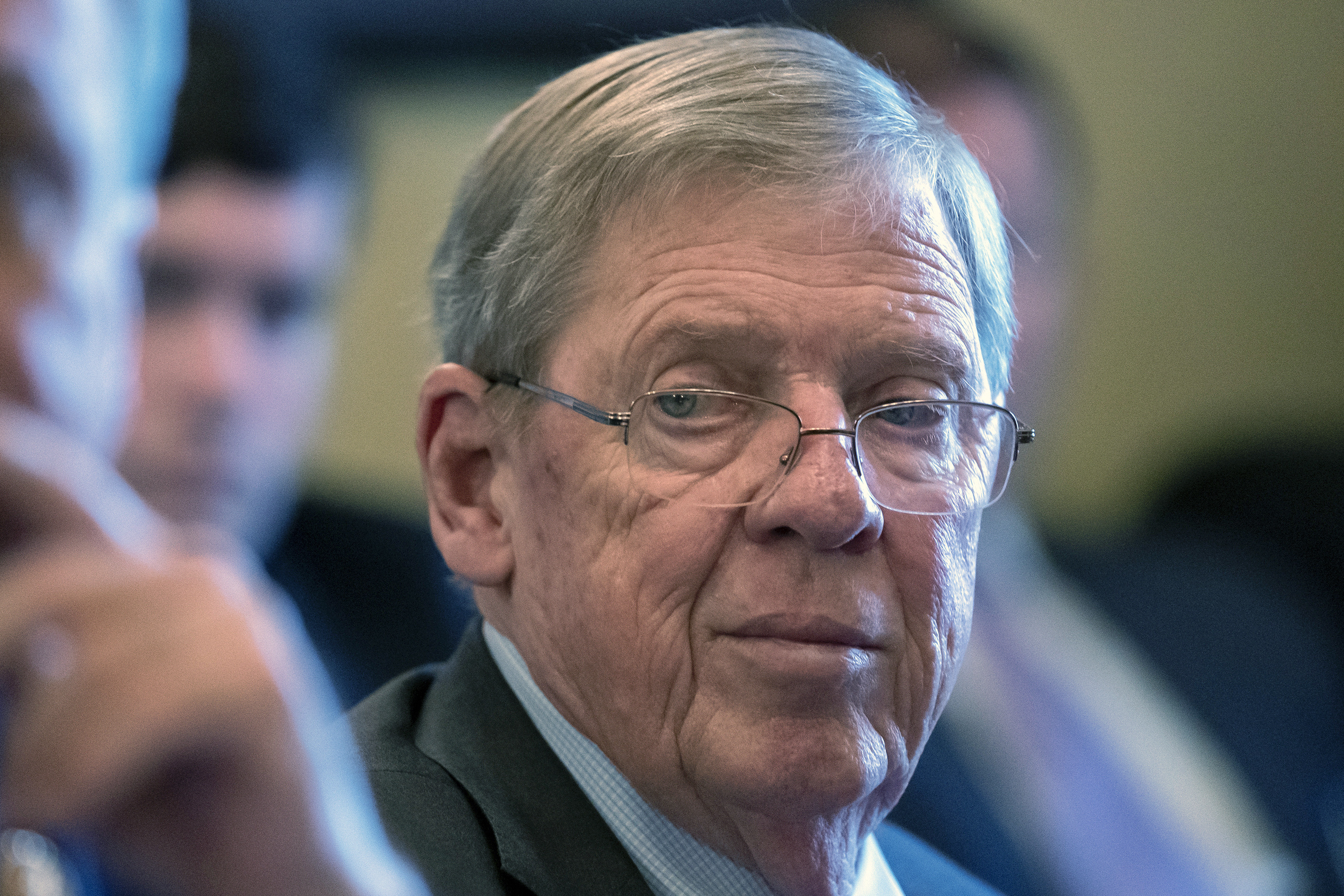 In this Feb. 14, 2019 photo, Sen. Johnny Isakson, R-Ga., leads a meeting on Capitol Hill in Washington. Isakson, an affable Georgia Republican politician who rose from the ranks of the state Legislature to become a U.S. senator, has died. He was 76. Georgia Gov. Brian Kemp’s office confirmed the death in a news release Sunday, Dec. 19, 2021.